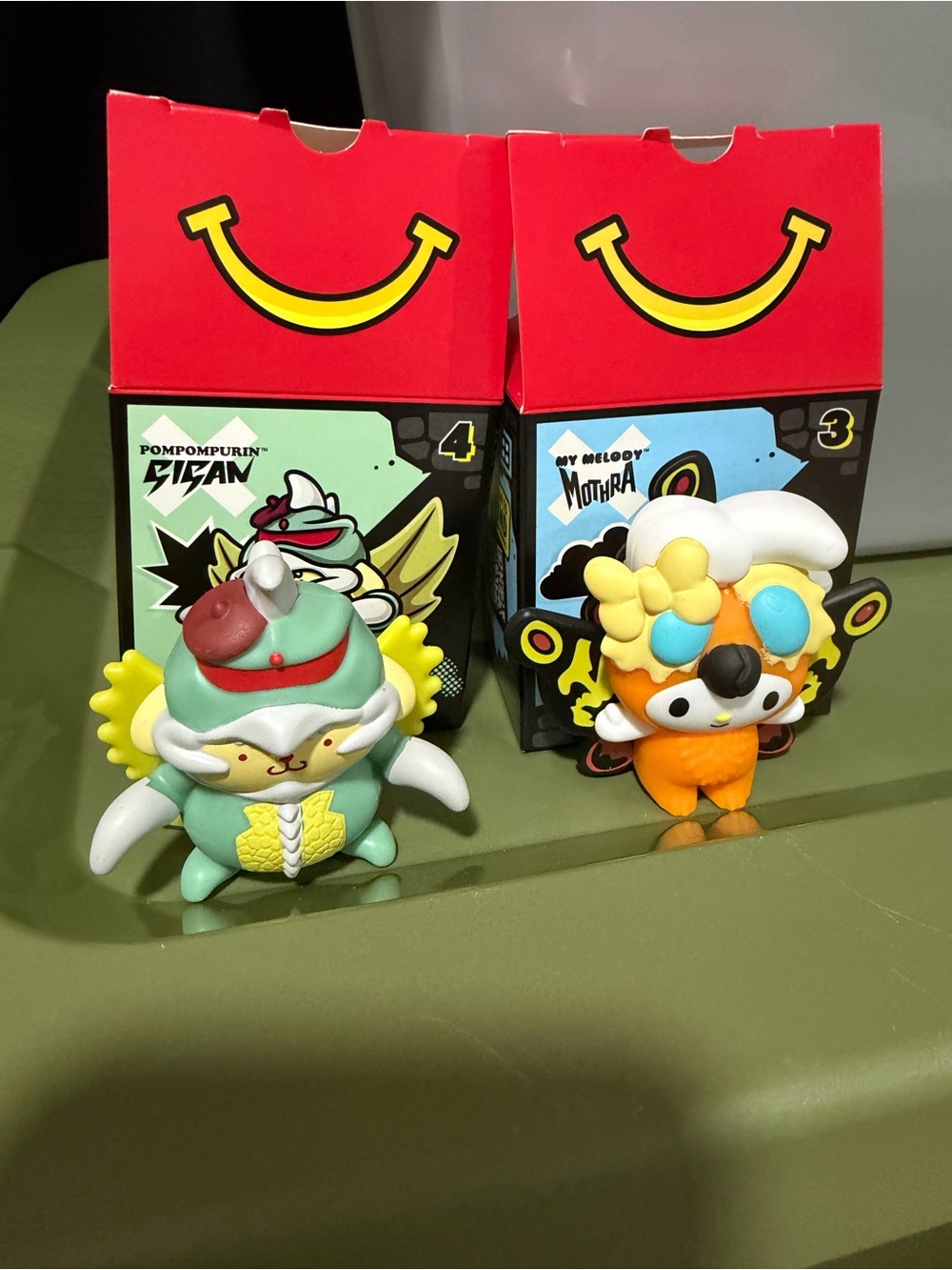 Pompompurin x My Melody Designer Vinyl Toy Figures - Green & Orange
